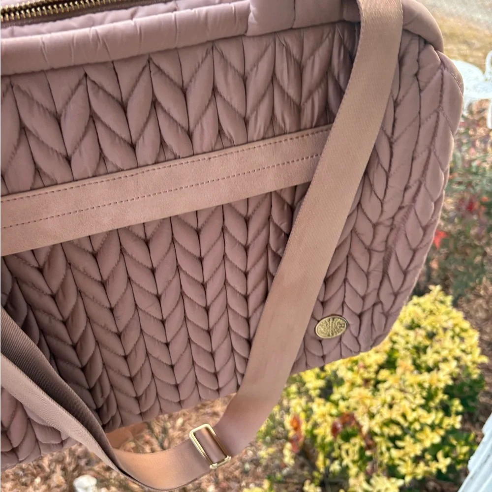 Pre owned Happ Brand Paige Caryall Diaper bag slight stain I can see in pic